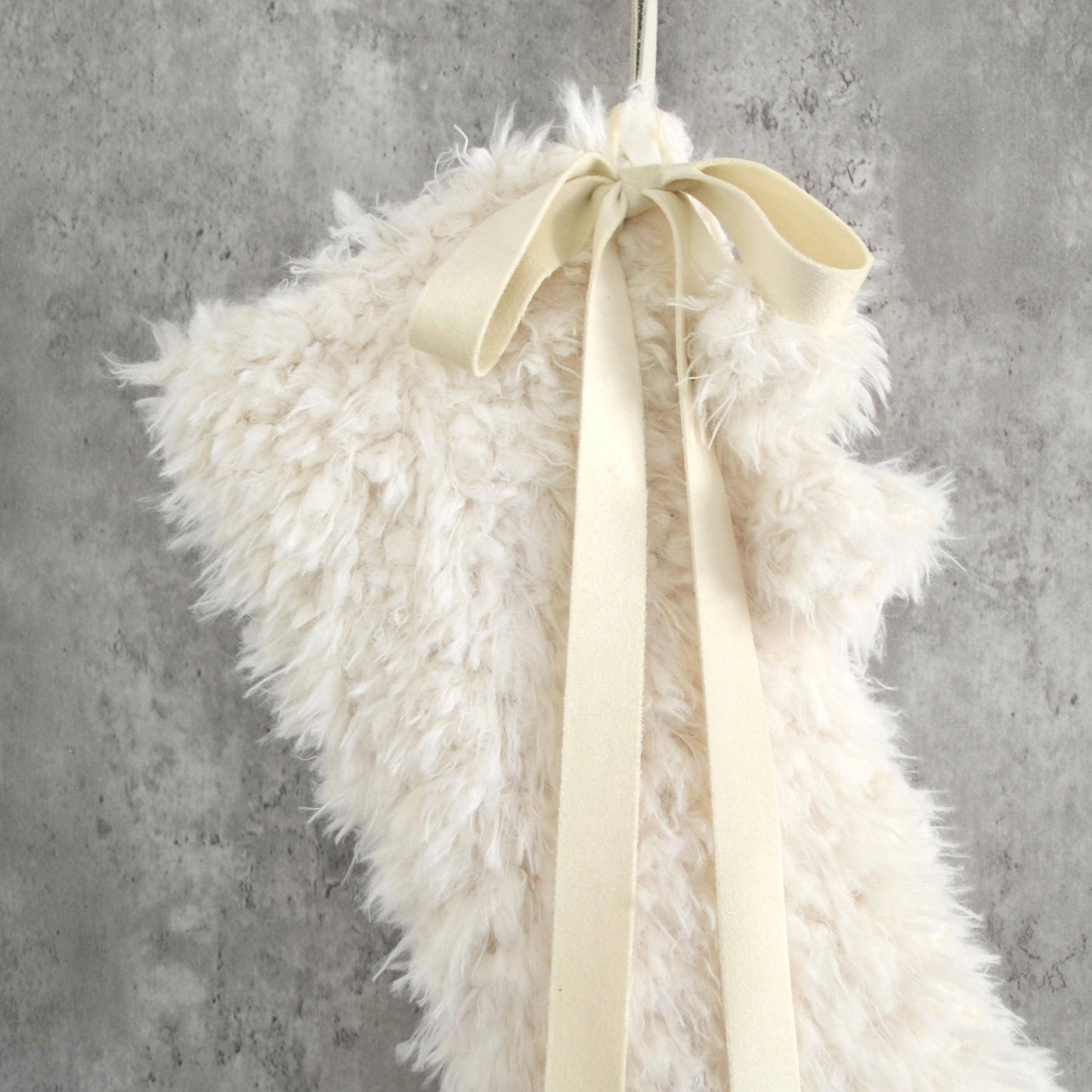 Ivory Sherpa Faux Fur Christmas Stocking with Fur Pom Poms and Velvet Bow